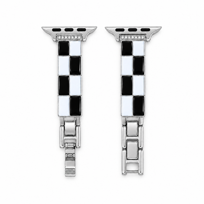 Black and white checkerboard Apple Watch band with silver-tone metal, flat view