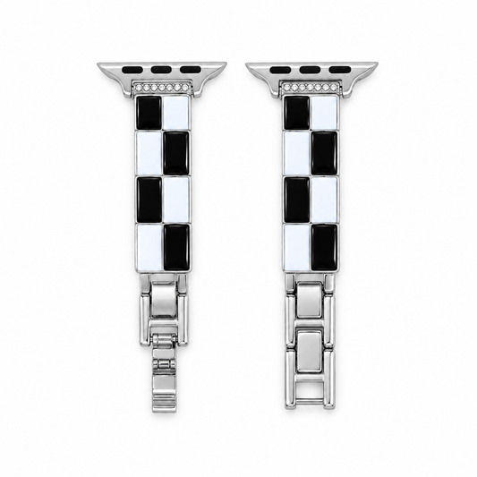 Black and white checkerboard Apple Watch band with silver-tone metal, flat view