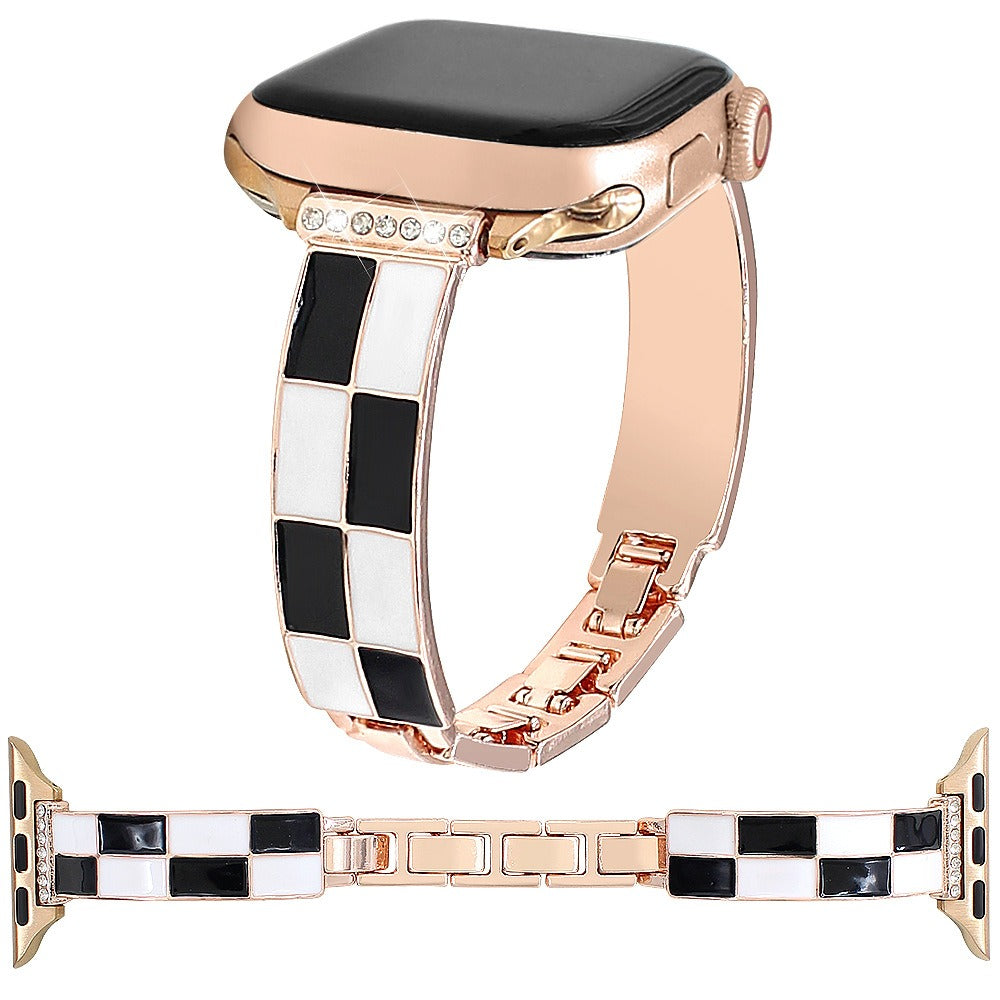 Black and white checkerboard band with rose gold-tone metal and Apple Watch