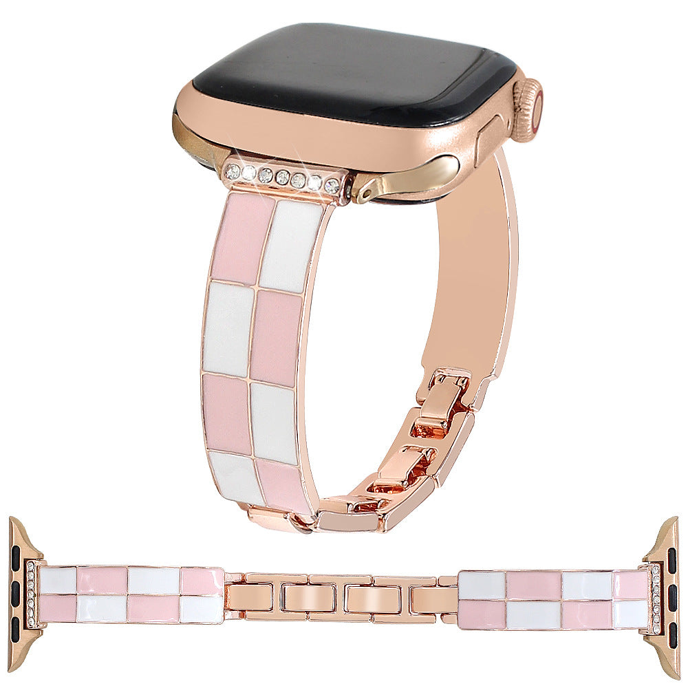 Pink and white checkerboard band with rose gold-tone metal and Apple Watch
